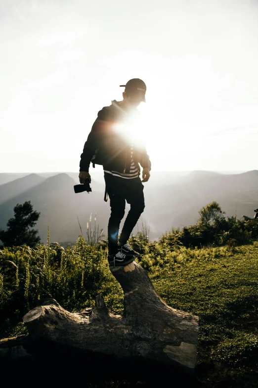 a man on a skateboard in the sun