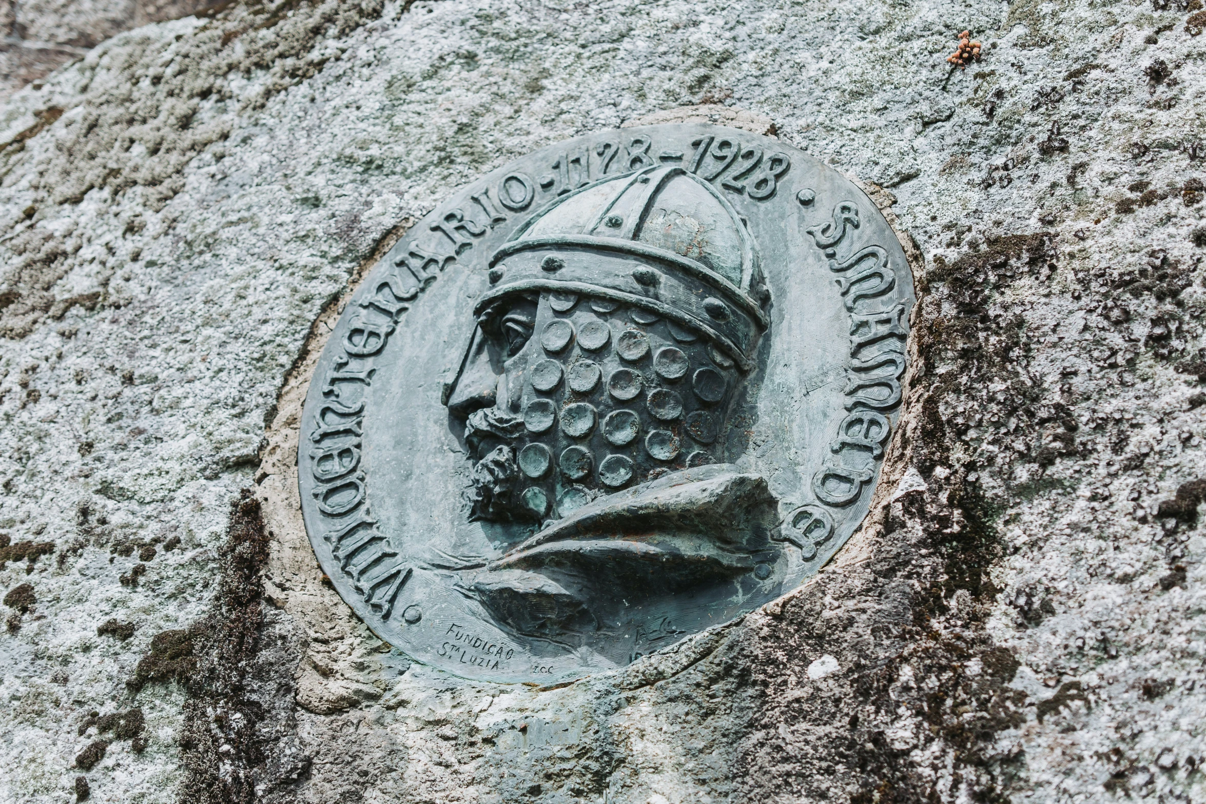 a symbol on a stone shows the time, date and location