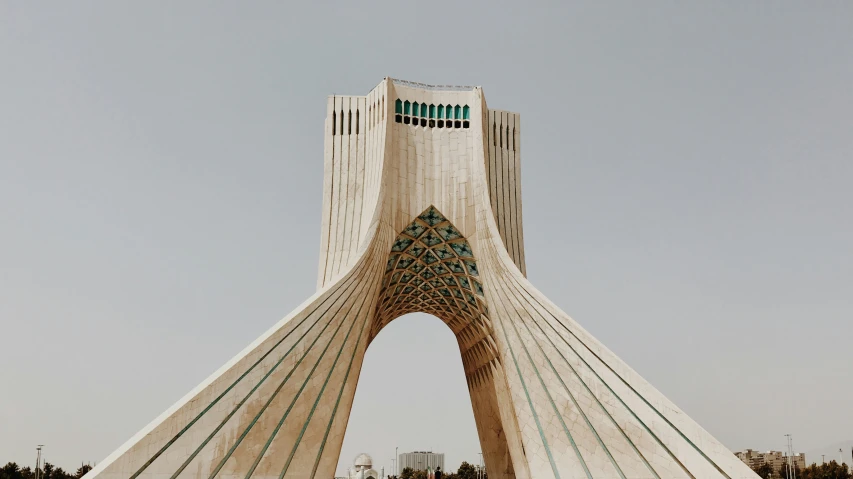 a very tall building with an ornate design on top