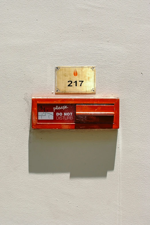a red box with a brown clock on it