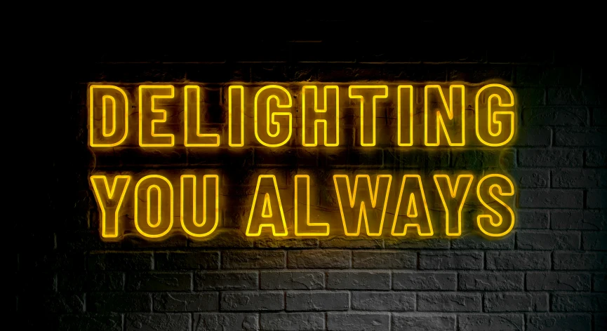 a yellow glowing text saying delighting you always