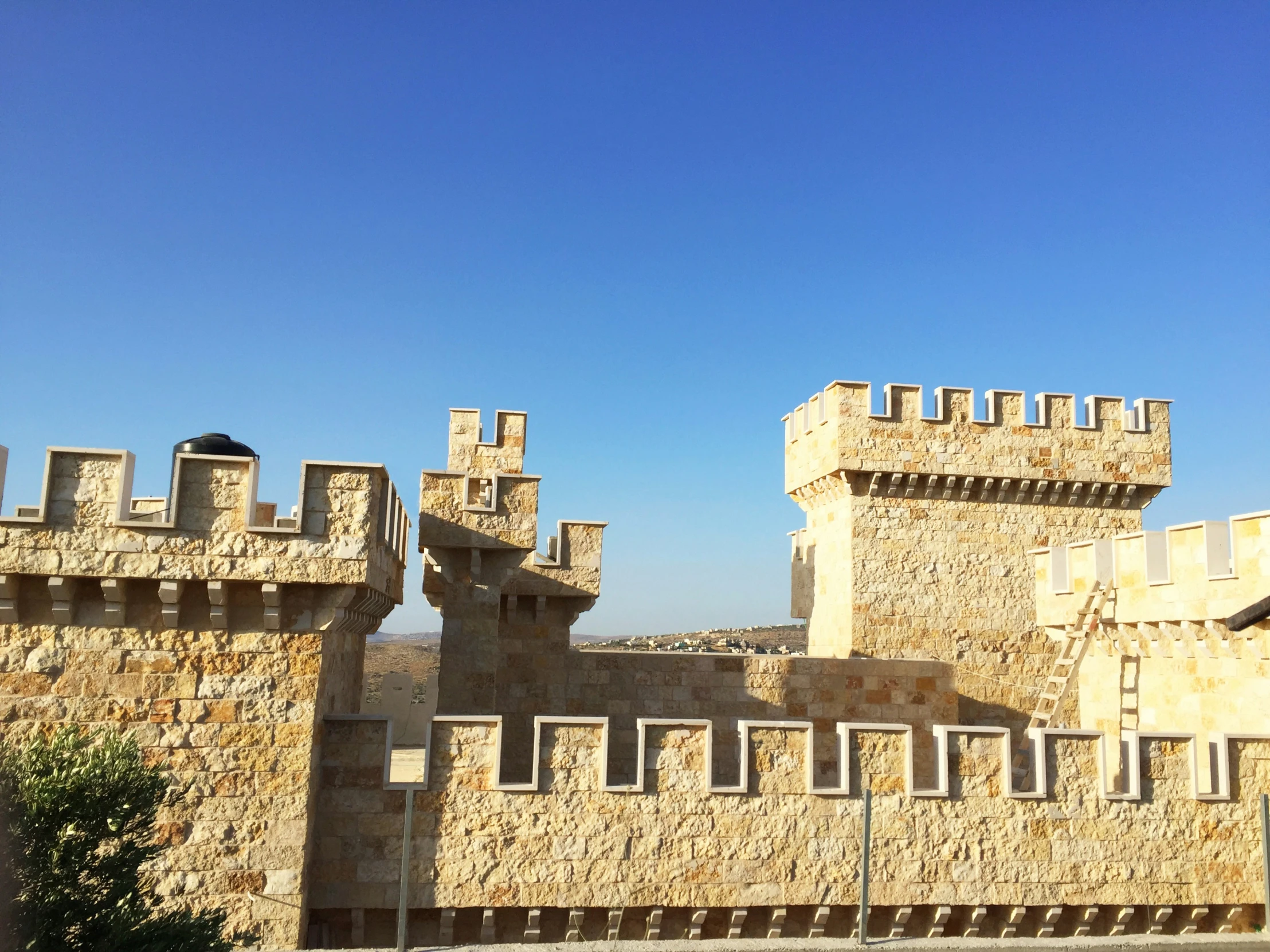 a tall castle like structure with lots of windows