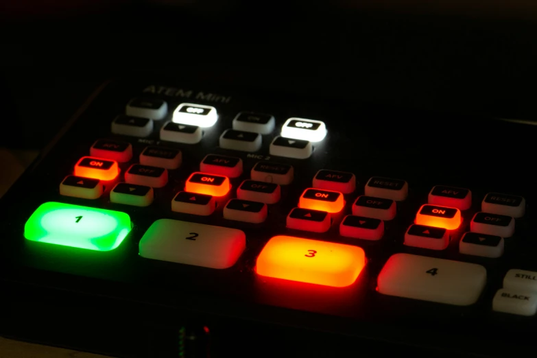 a keyboard that is illuminated by various colored lights