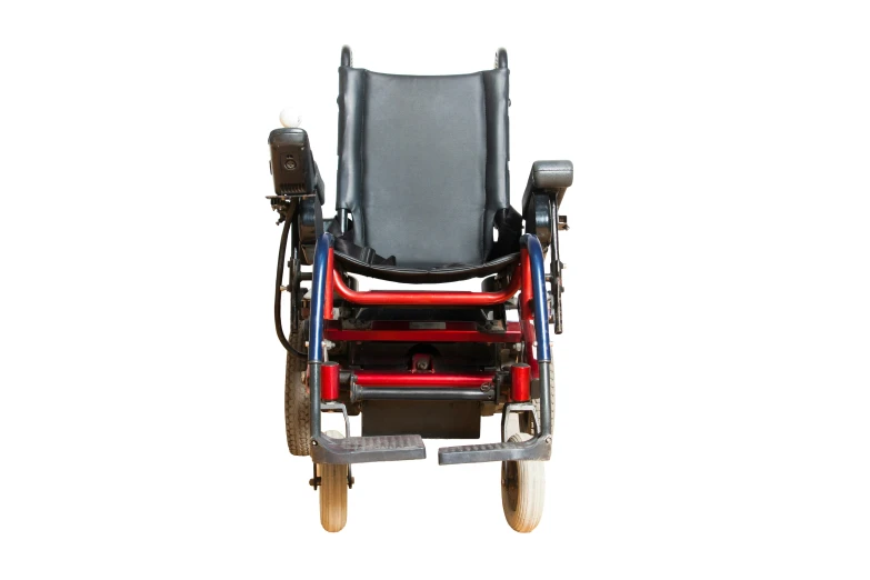 a small wheelchair with the footrests down