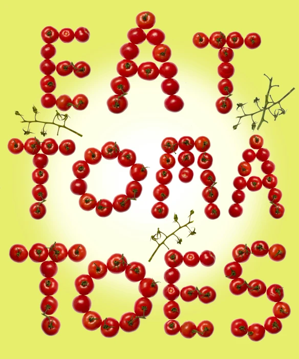 the word abc written out of cherries in red on a yellow background