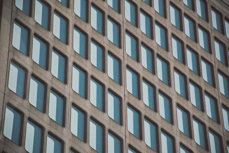an image of a building's windows seen from below