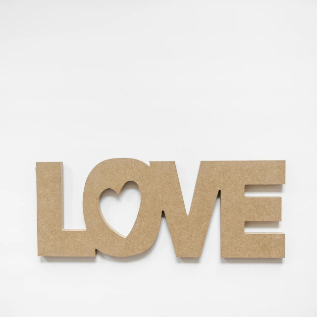 there is a piece of wood that says love