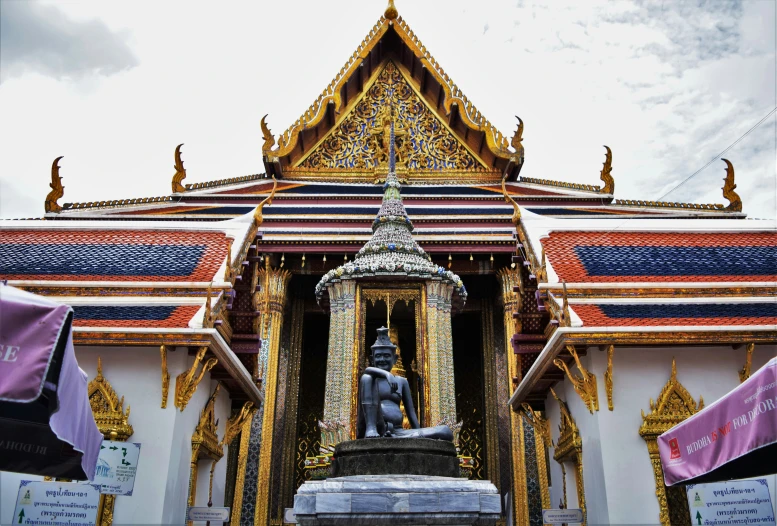 a building with a statue in front of it