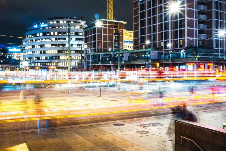 this is a very long exposure pograph with some buildings in the background