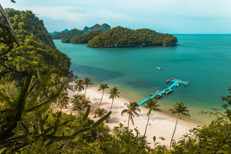 a view of several tropical islands from high up on a cliff