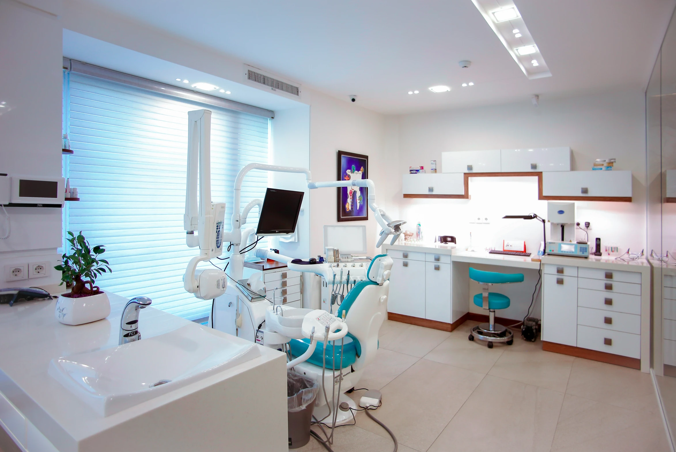 a dental room with multiple machines in it