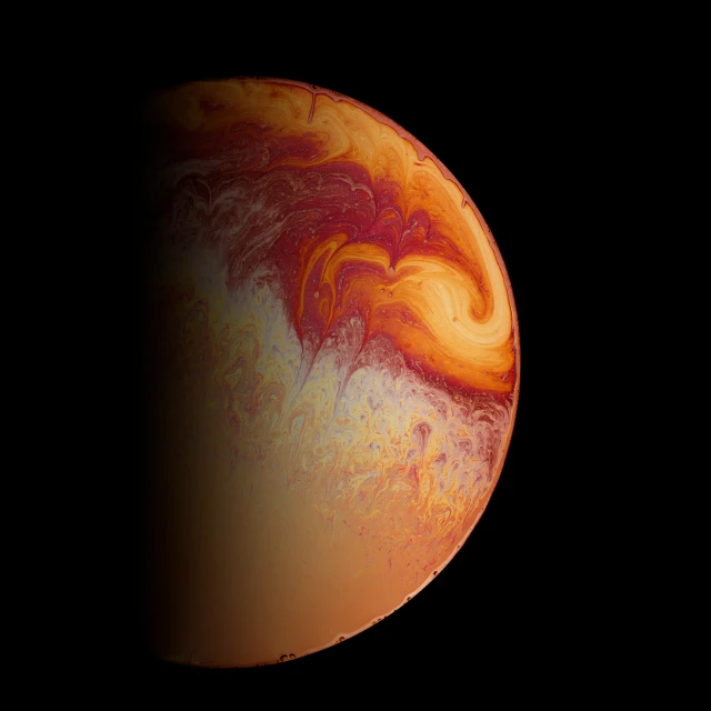 an orange and black object with red streaks