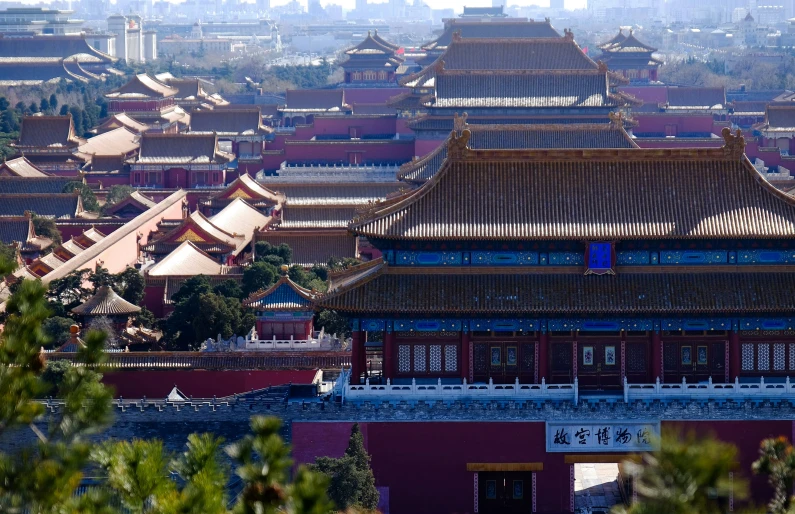 a po taken from an up - a - mountain looking down on the city of china