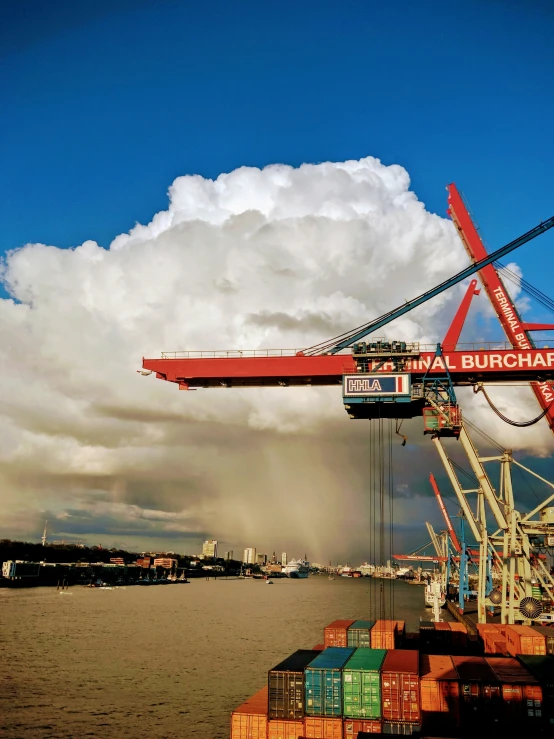 a boat that is in the water with a crane