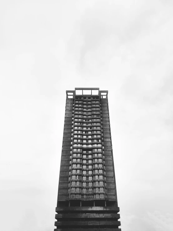 a tall building with lots of windows and lots of stairs