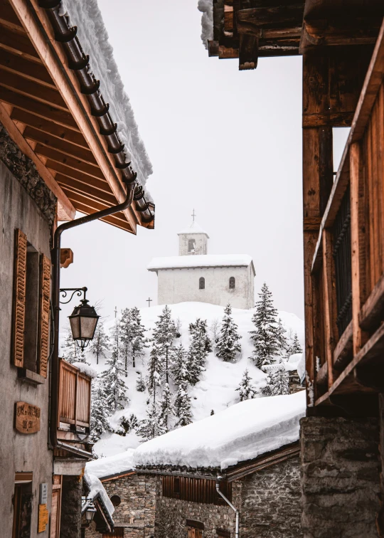 the outside of the buildings have snow on them