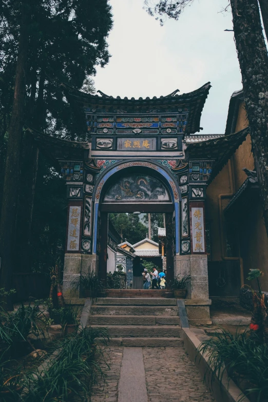 there are some stairs going through an arch