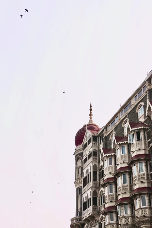 an elaborate building with many balconies and ornate architecture