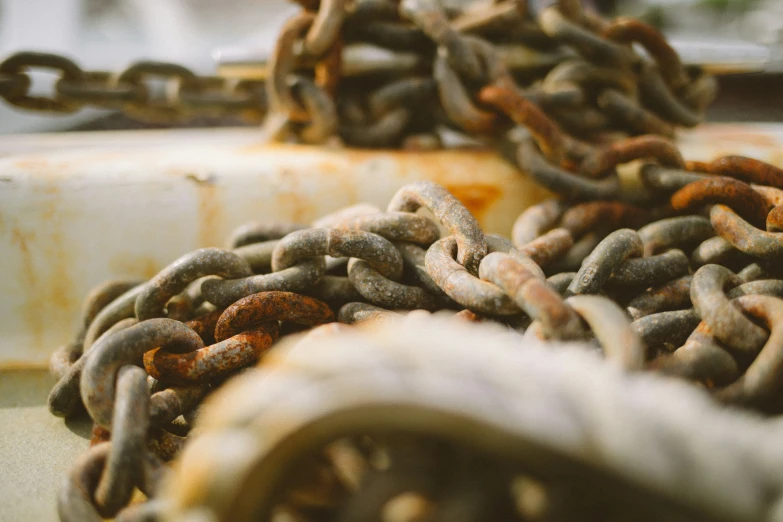 a lot of chains sitting on a table