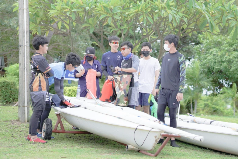 the s are hanging out with their paddle boats