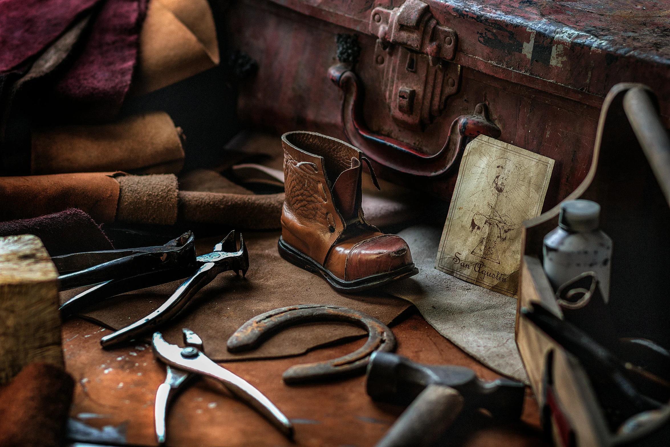 a pile of various work accessories sitting on top of a table