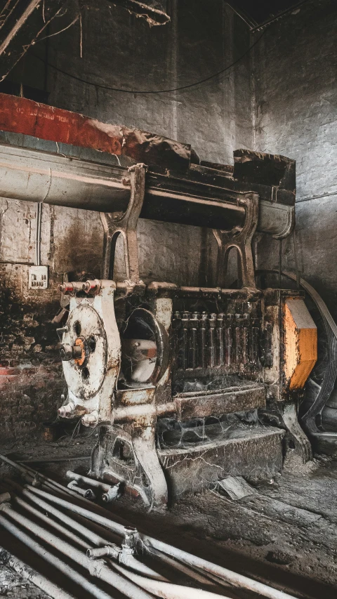 several old type of mechanical machinery in a building