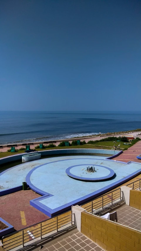 aerial view of an ocean - level park near the beach