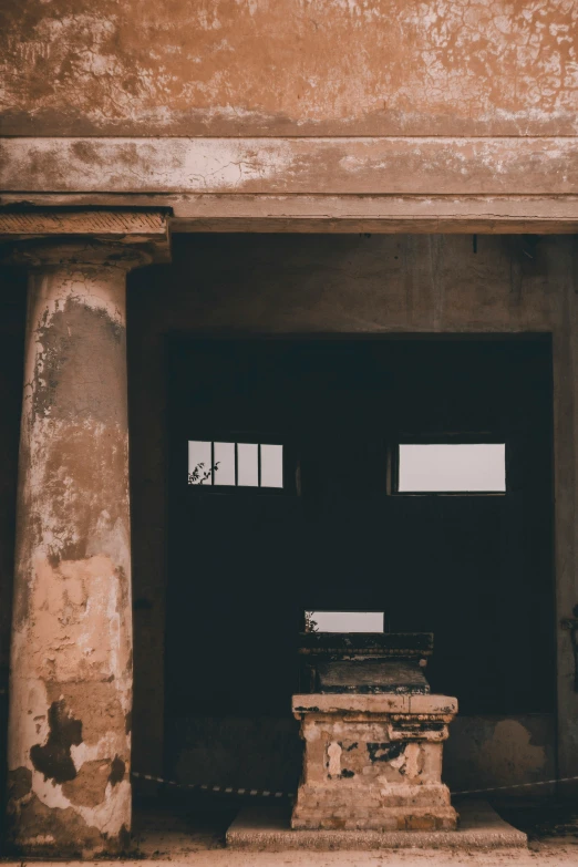 an old building with a bench near it