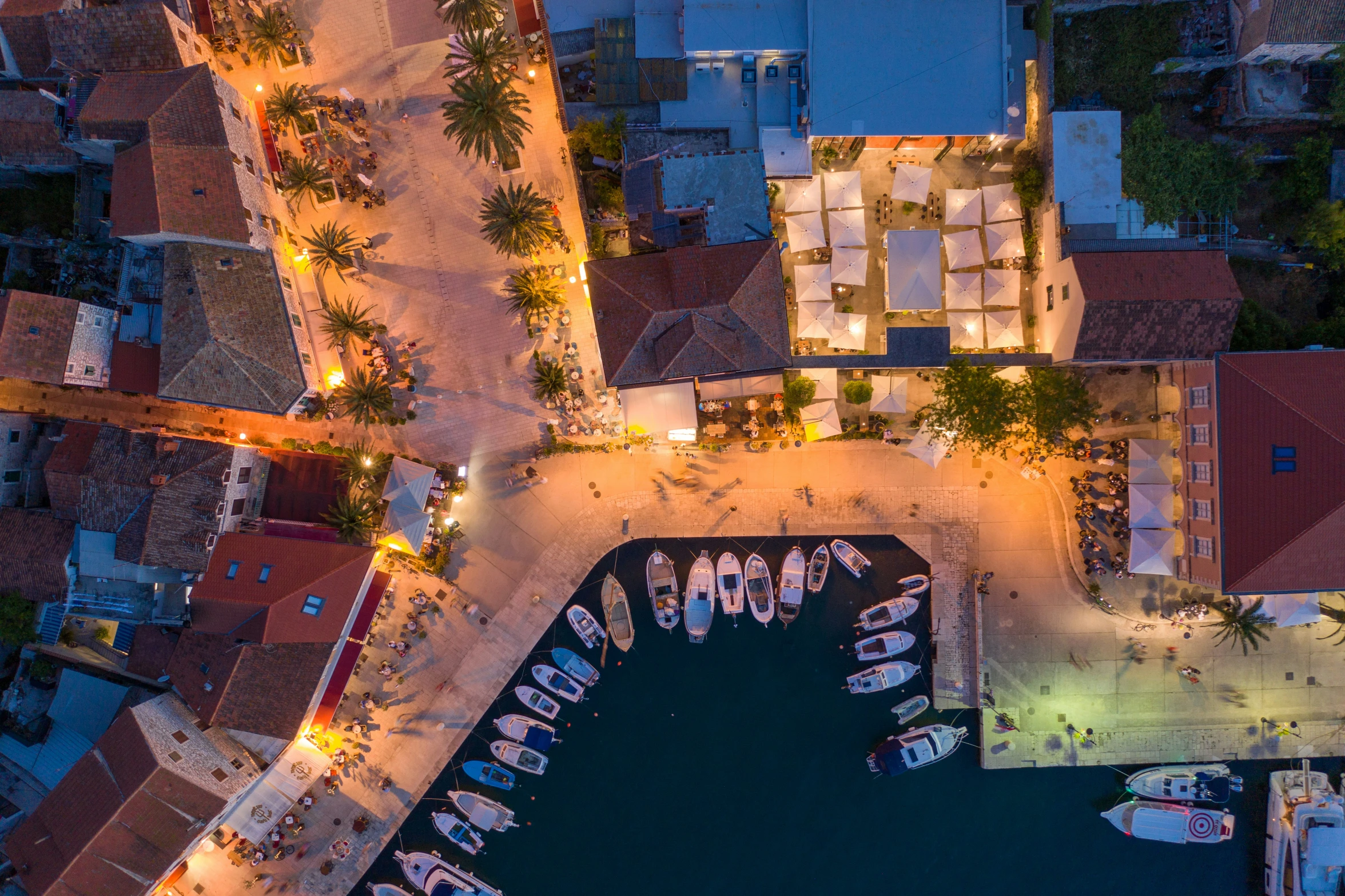 an aerial s of boats and dock at night