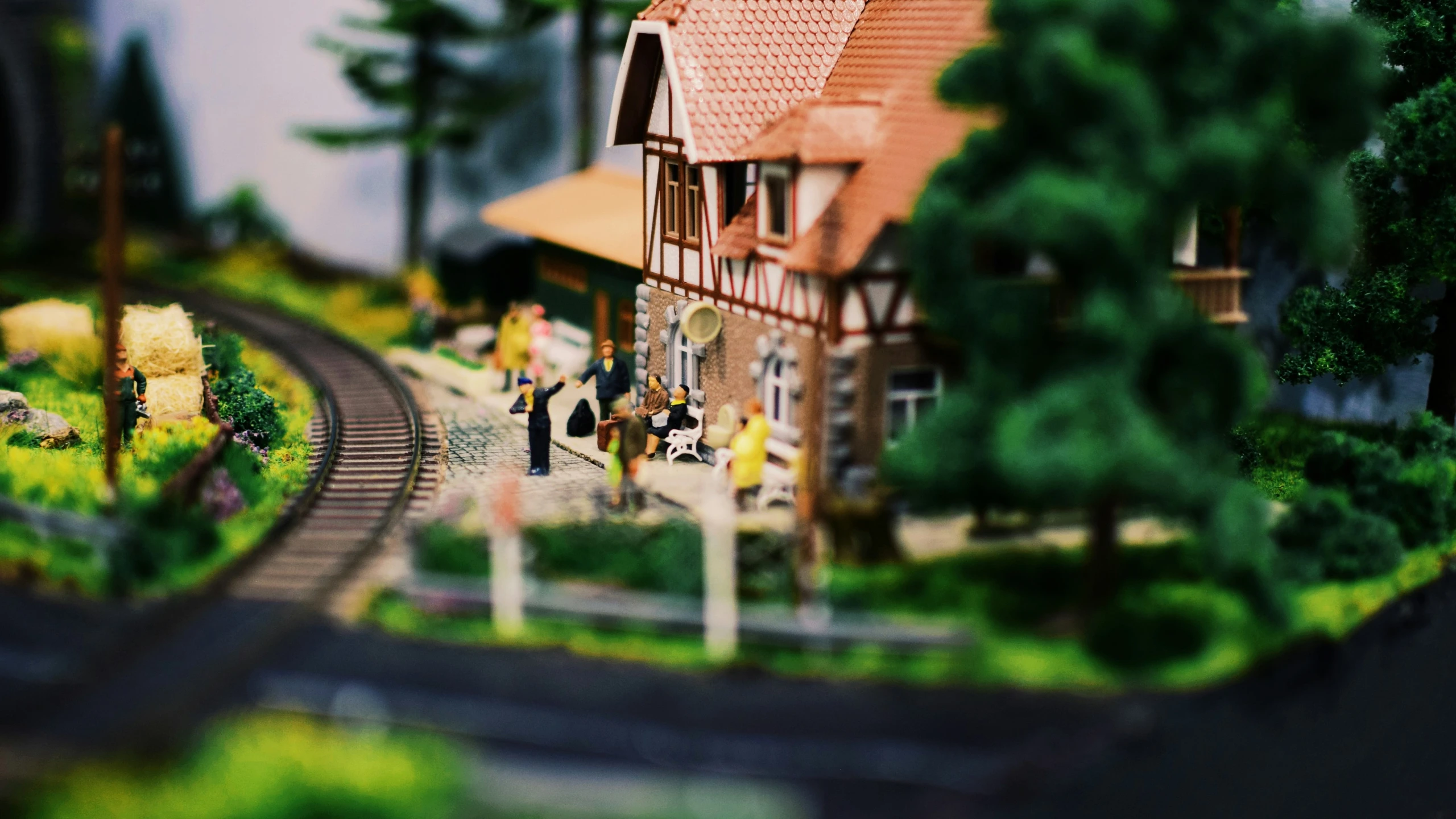 a house is shown with miniature people on it