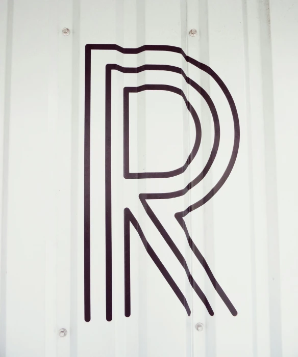 the letter r drawn on a truck