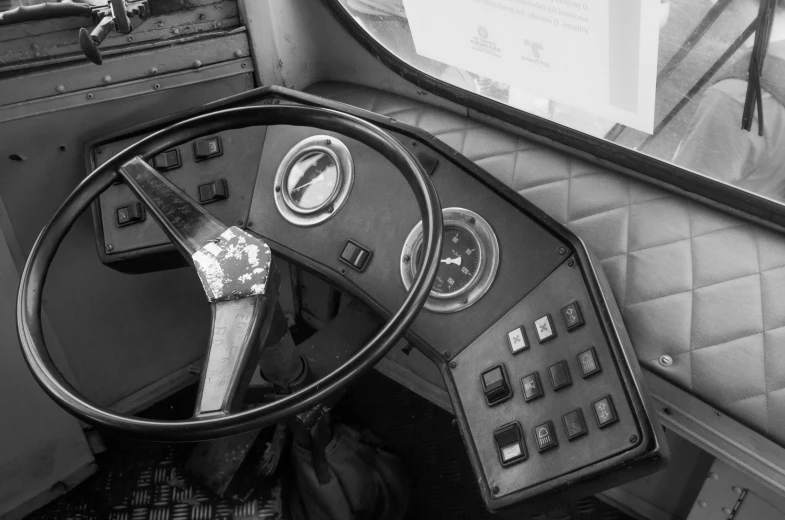 view of the steering wheel, dashboard, and dashboard with ons