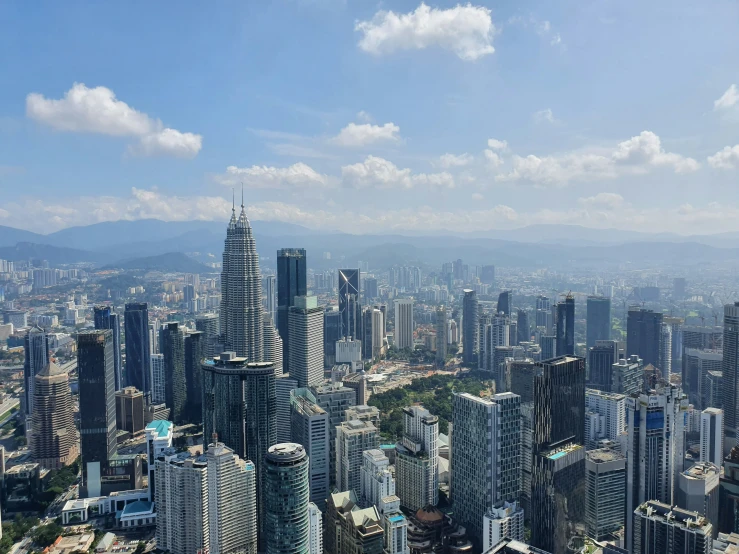 the city is surrounded by a lot of tall buildings