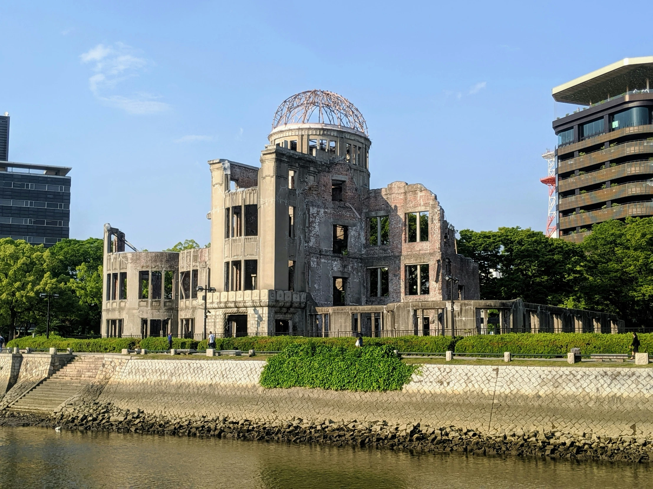 old ruins, like a nuclear war hospital, in front of a city