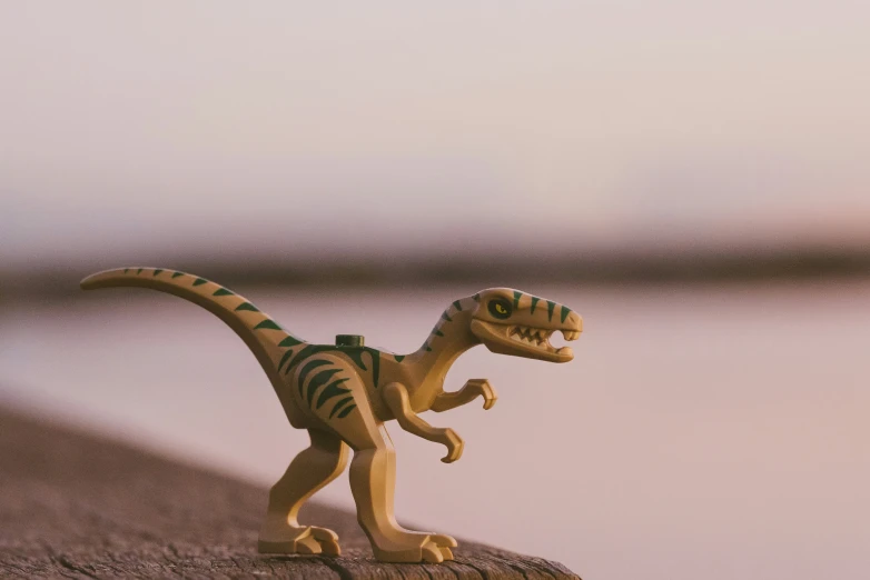 a toy dinosaur that has a skeleton on it