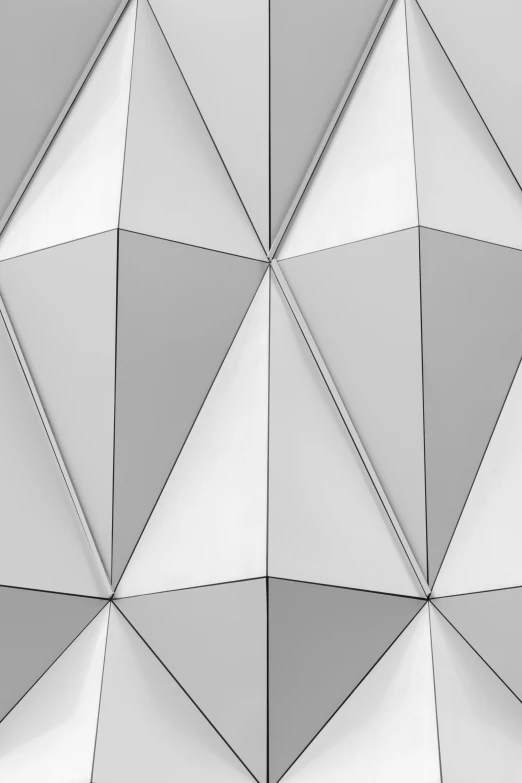 the pattern in a modern building, consisting of white squares and gray triangles