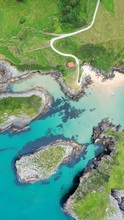 an aerial view of a small beach