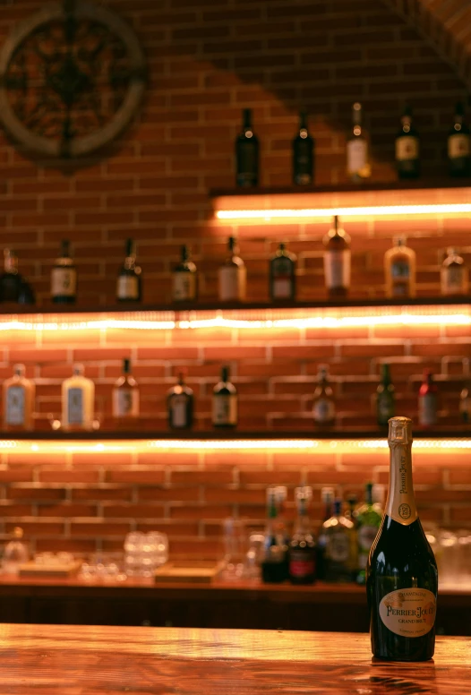 a bottle of wine sitting on top of a counter