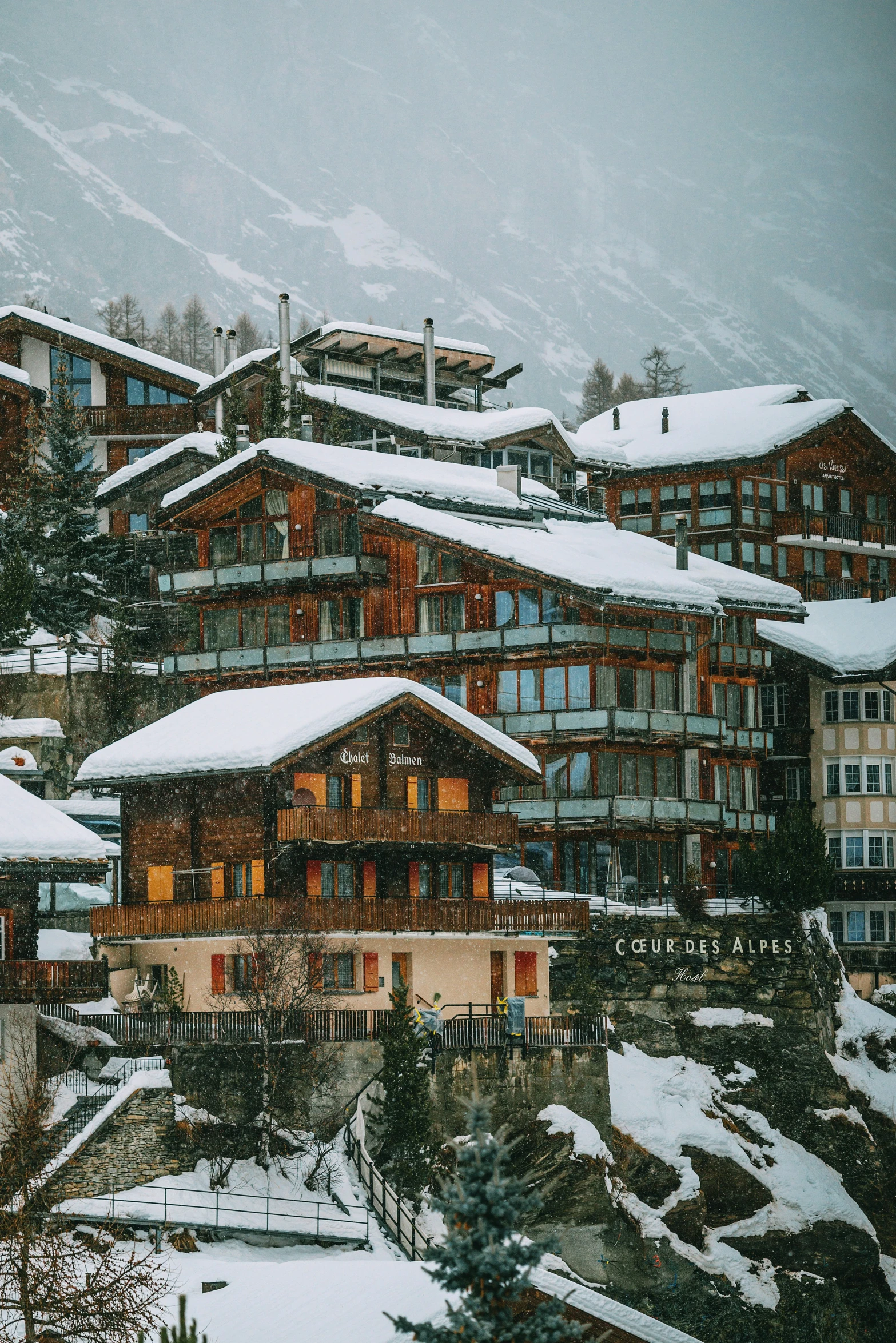 a mountain lodge is situated in the mountains