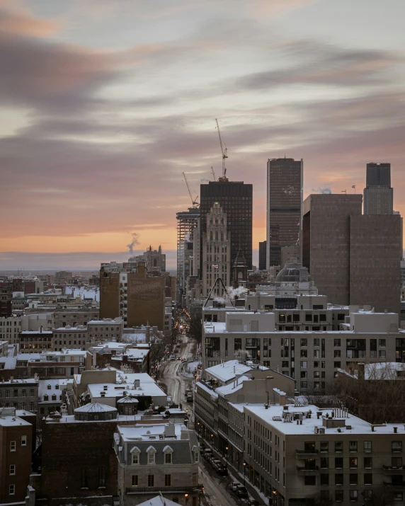 a group of buildings that are in the snow