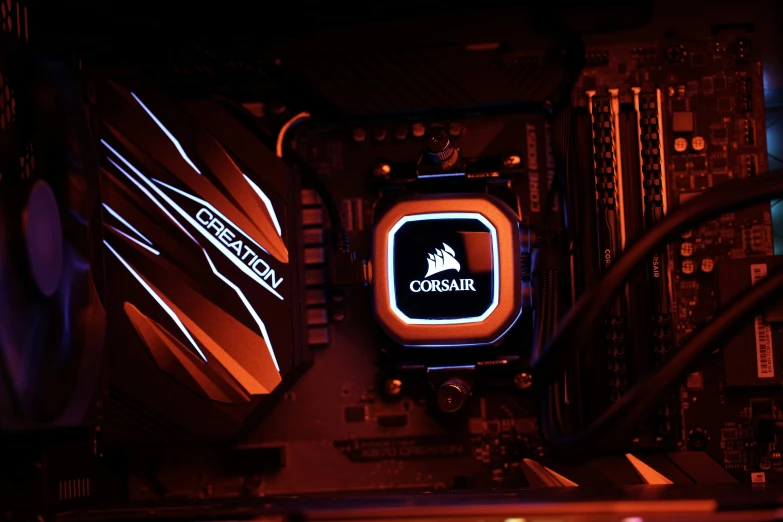 the motherboard with a black and red light shining on it