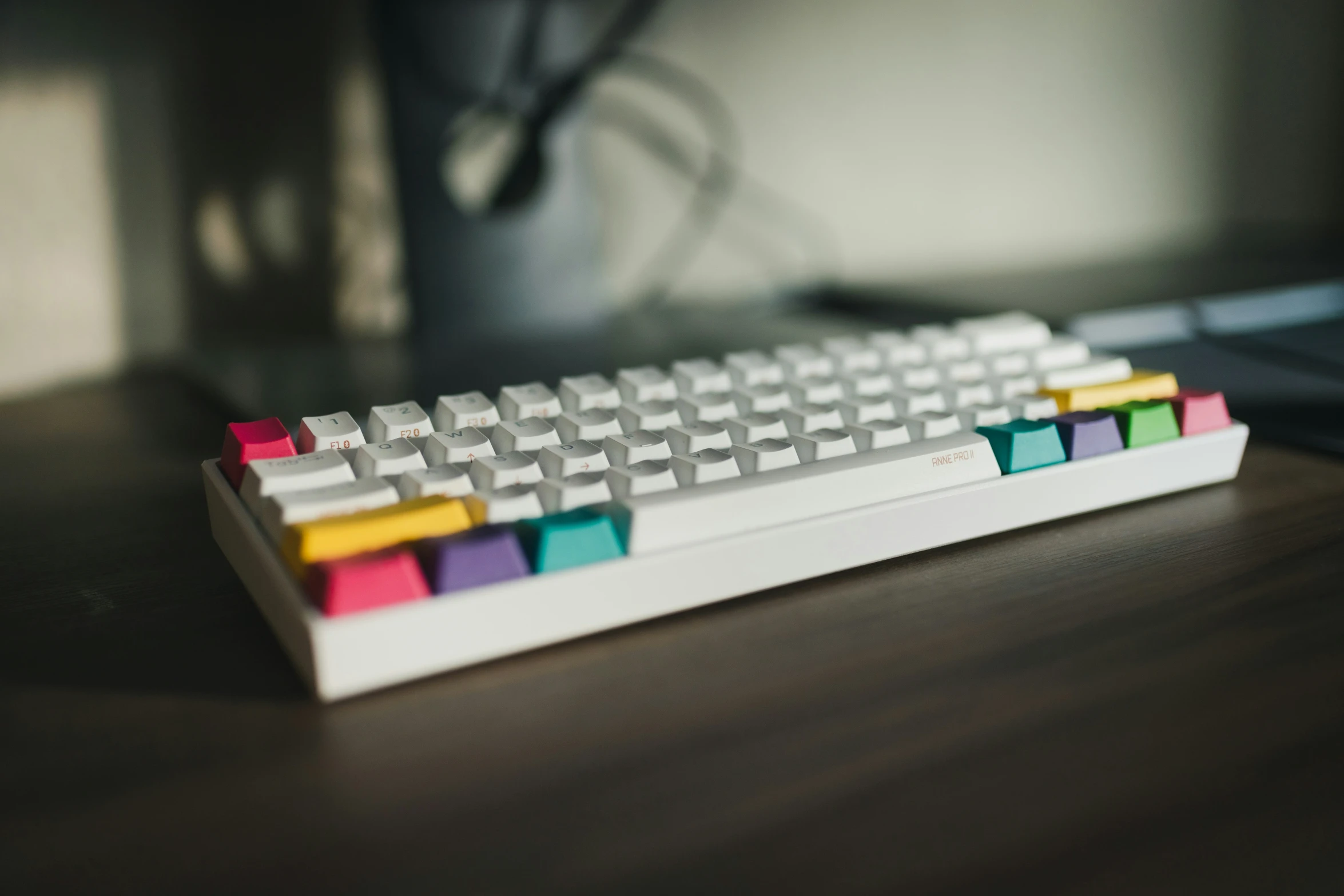 a keyboard with several colored keys on top