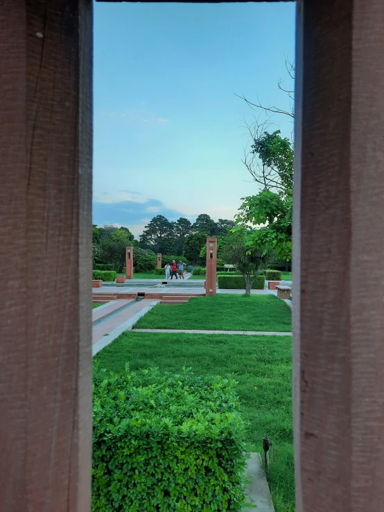 a picture from a window of a grassy landscape