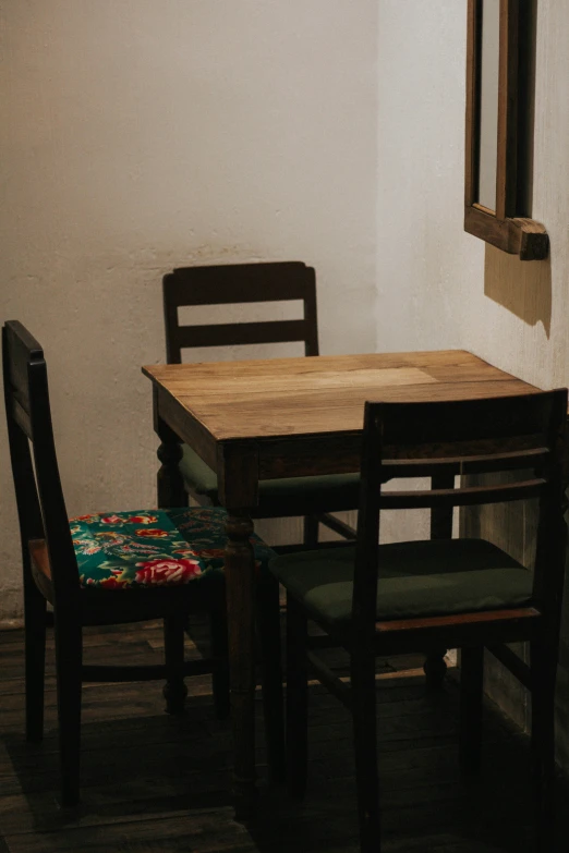 a small table that has been set with a chair