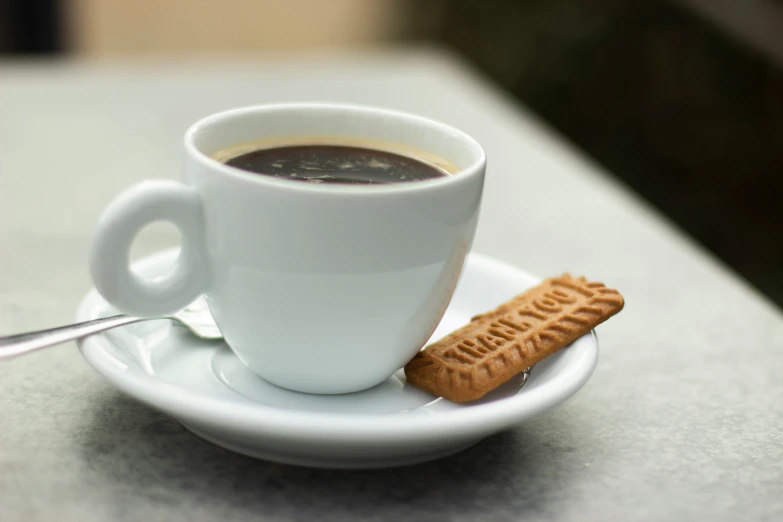 a plate with an egg slice and coffee