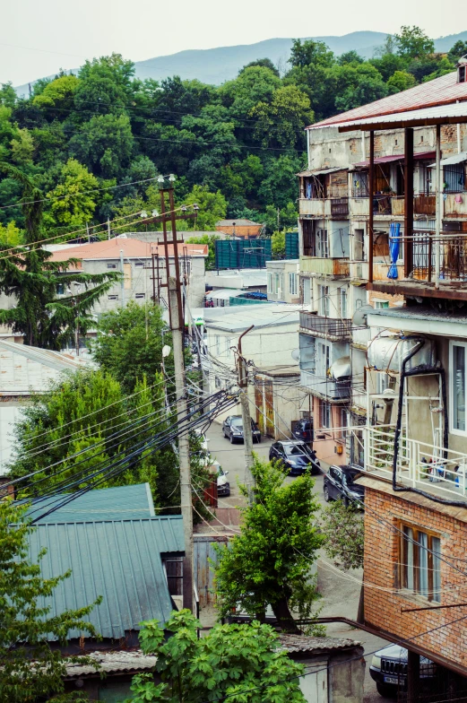 a city with lots of tall buildings on a hillside