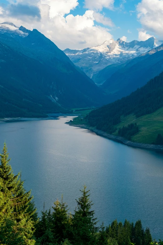 a view of a large body of water in the mountains