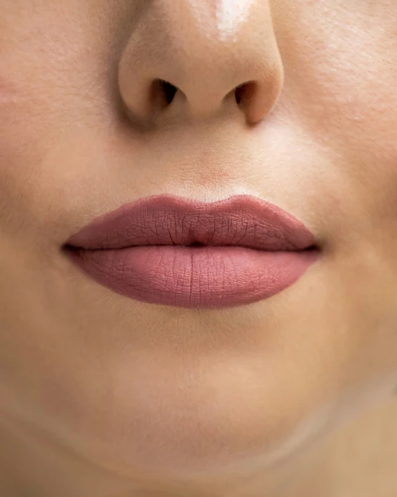 the woman's lips are shown in close up