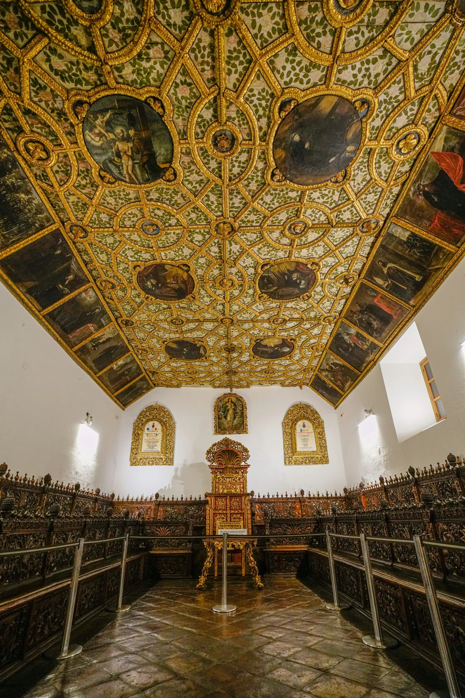 a ceiling with pictures of people on it