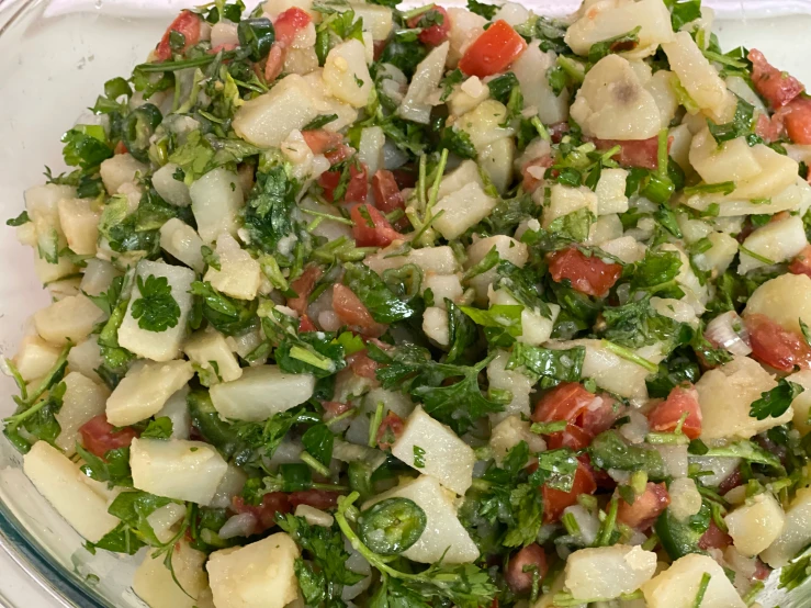 a bowl full of chopped up vegetables is shown